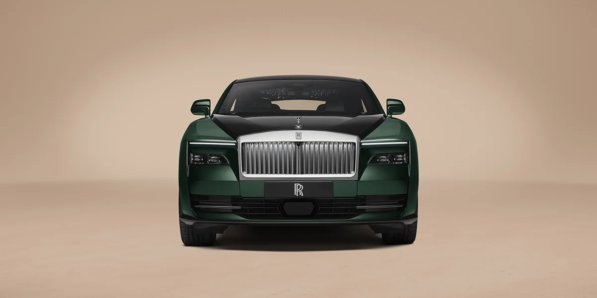 2027 Rolls-Royce Spectre Series II front exterior view with illuminated Pantheon grille