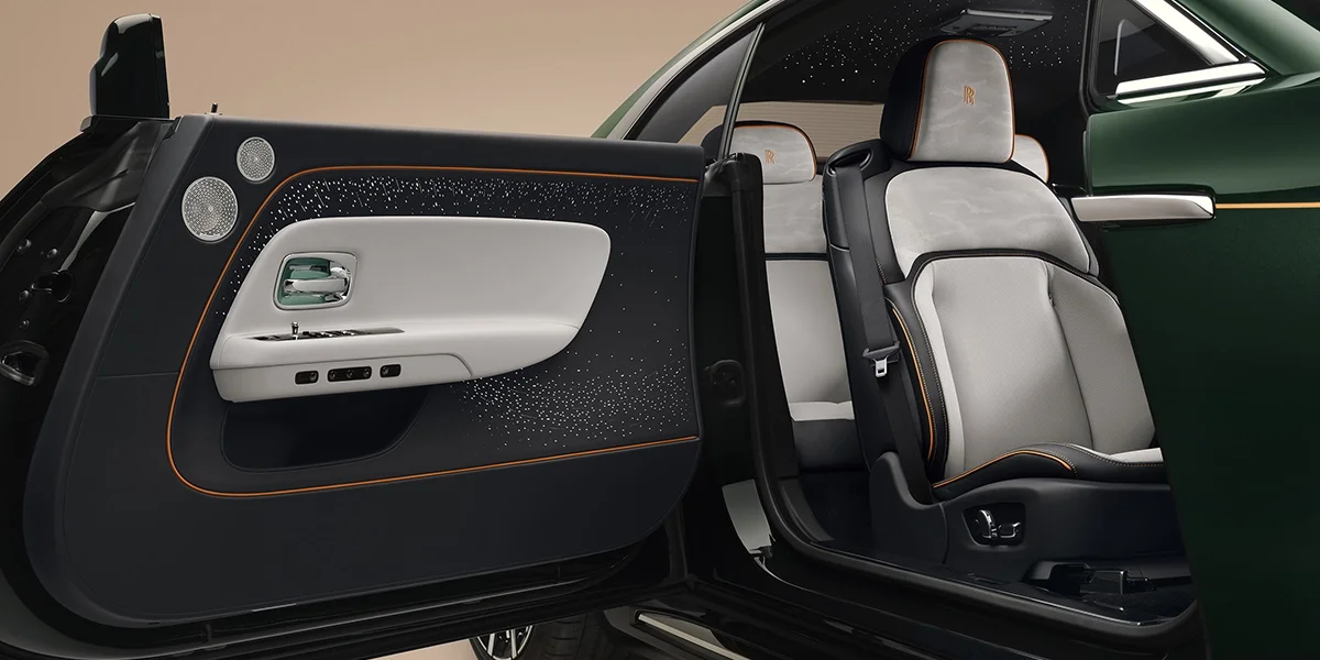 2027 Rolls-Royce Spectre Series II interior with illuminated fascia, leather seating, and Starlight Doors